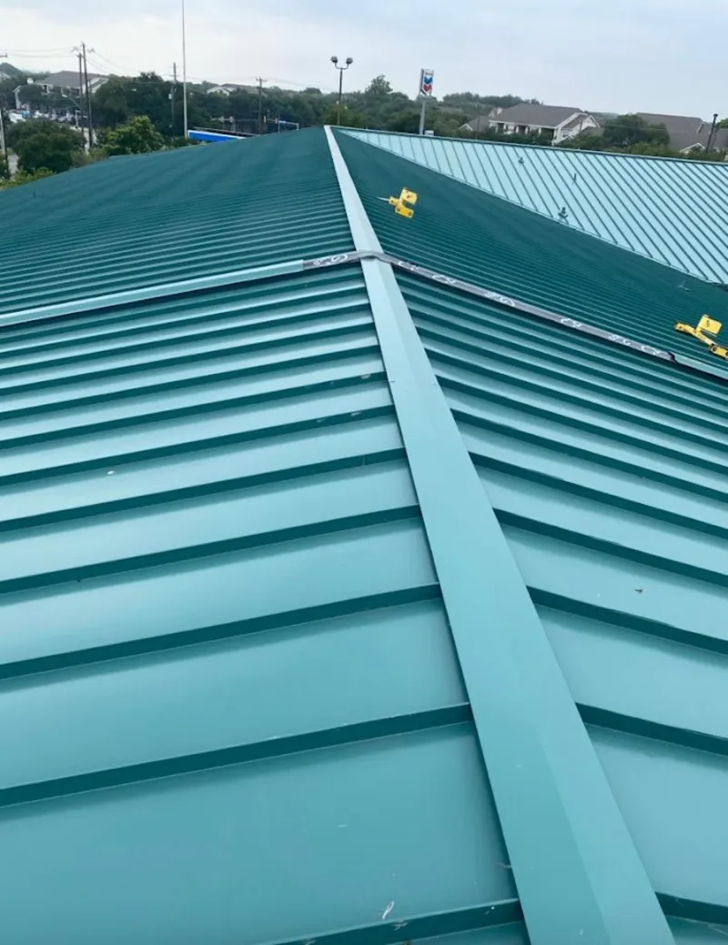 Green commercial metal roof ridge and valley for Metal Roof Repair in Monessen