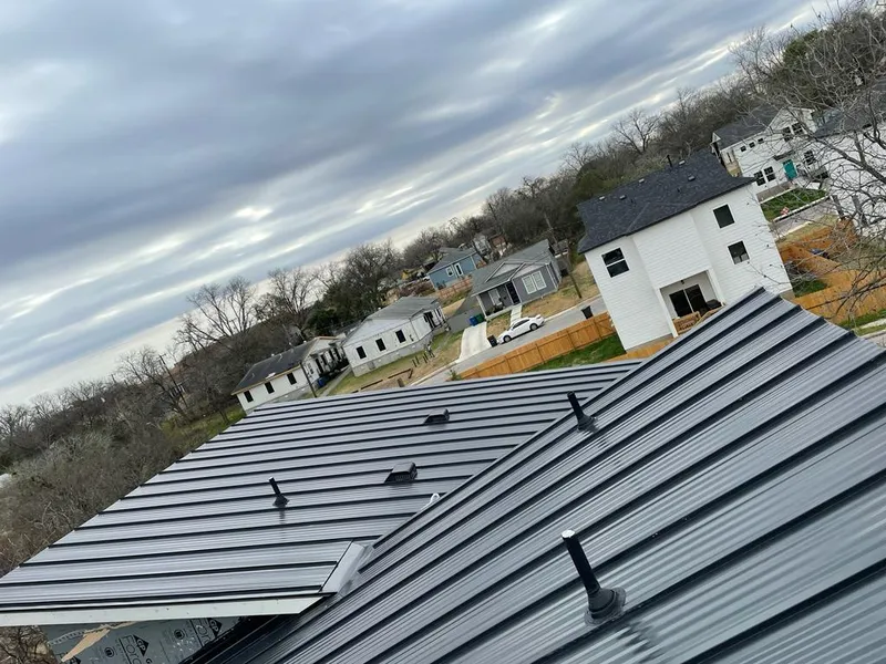 Standing seam metal roof panels with vents for Skylight Repair in Monessen